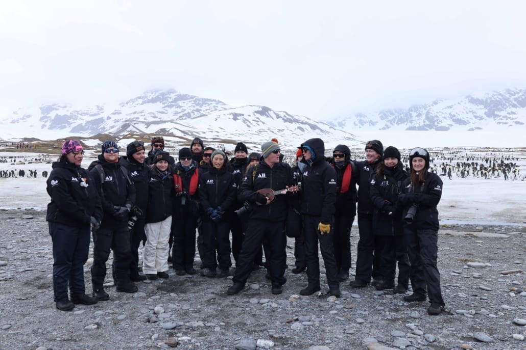 Peter Fisher and Kelly Davenport leading the Inspiring Explorers in song Inspiring Explorers Expedition South Georgia Antarctic Heritage Trust